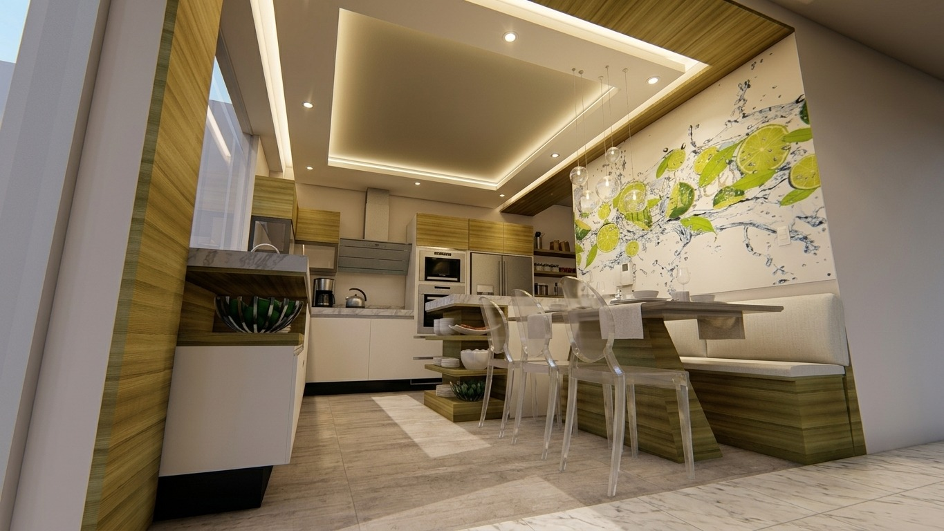 Cocina y comedor con mobiliario verde claro y obra cítrica